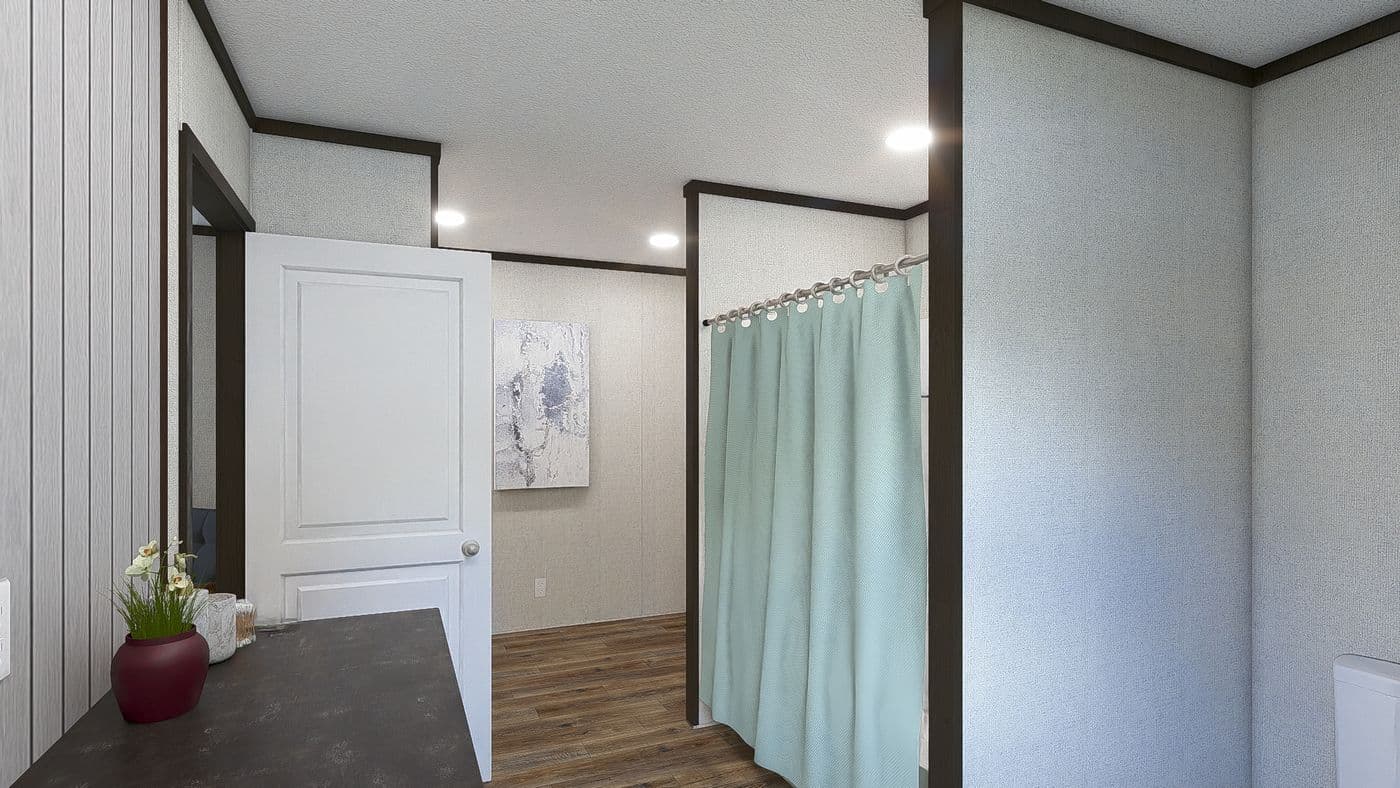 The ESSENCE Primary Bathroom. This Manufactured Mobile Home features 3 bedrooms and 2 baths.