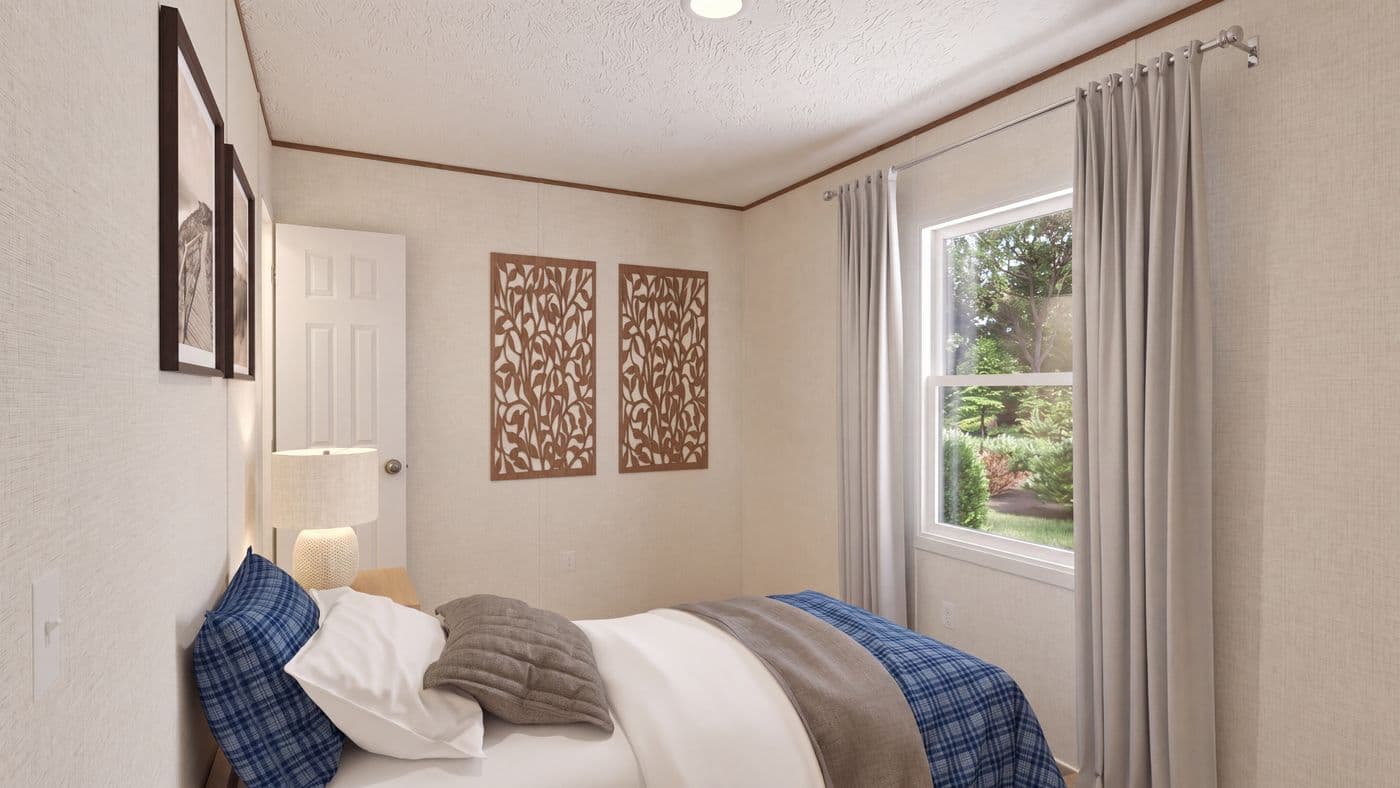 The DOGWOOD Guest Bedroom. This Manufactured Mobile Home features 2 bedrooms and 2 baths.