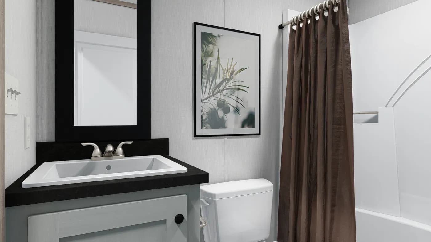 The 6616-4711 THE PULSE Guest Bathroom. This Manufactured Mobile Home features 3 bedrooms and 2 baths.