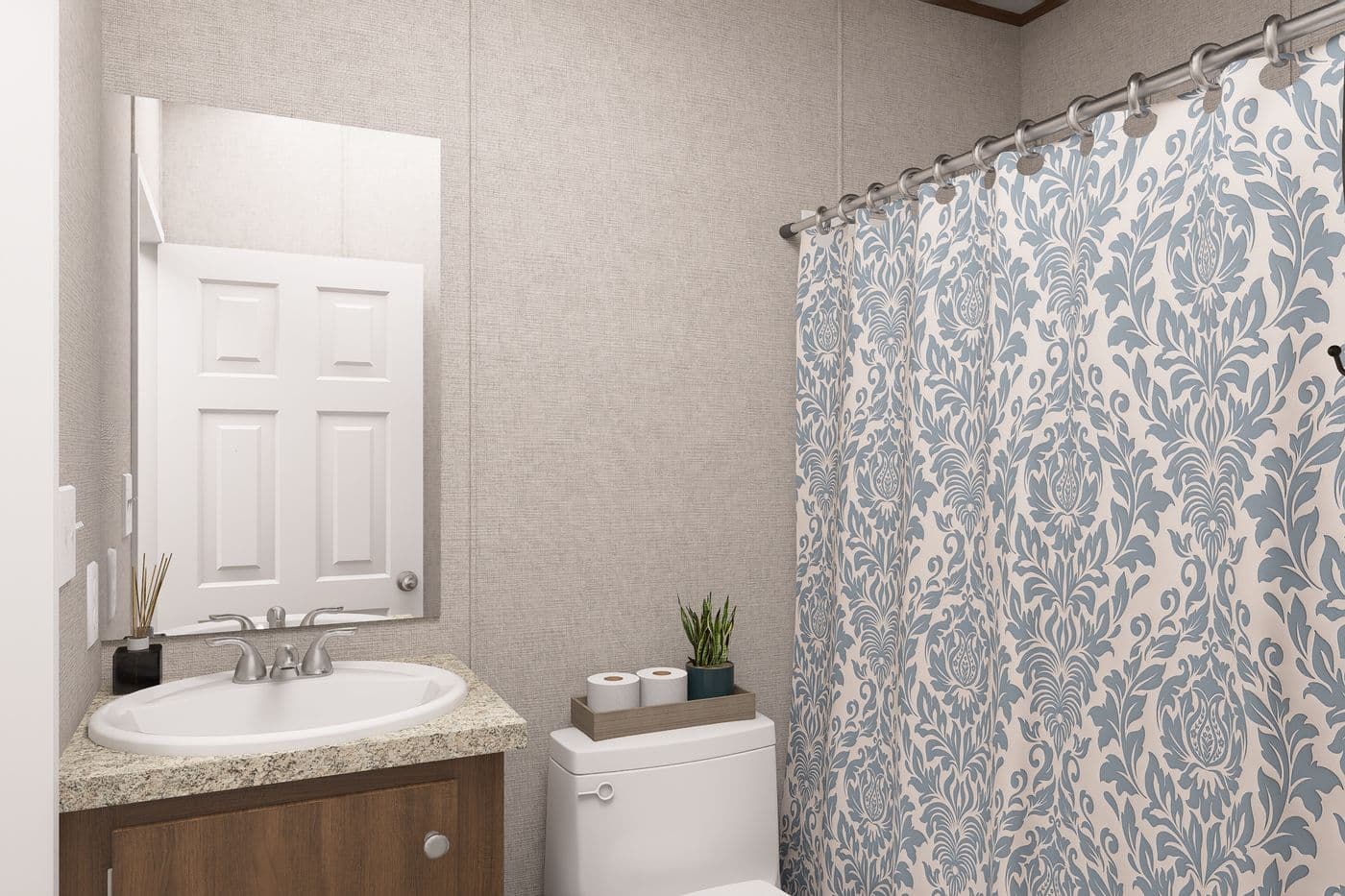 The CYPRESS Guest Bathroom. This Manufactured Mobile Home features 4 bedrooms and 2 baths.