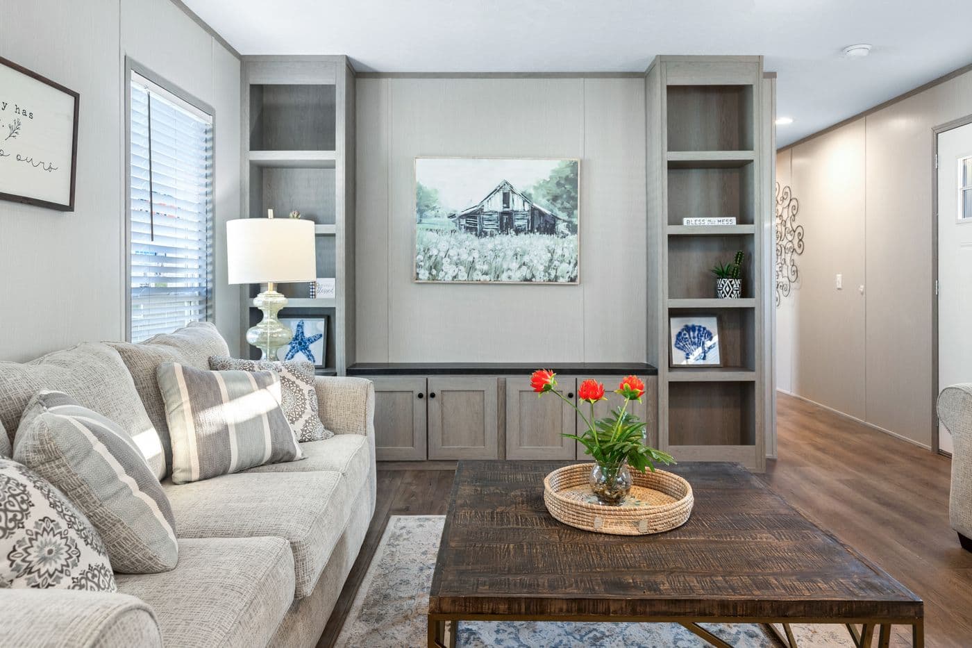 The RESOLUTION 16763X Living Room. This Manufactured Mobile Home features 3 bedrooms and 2 baths.