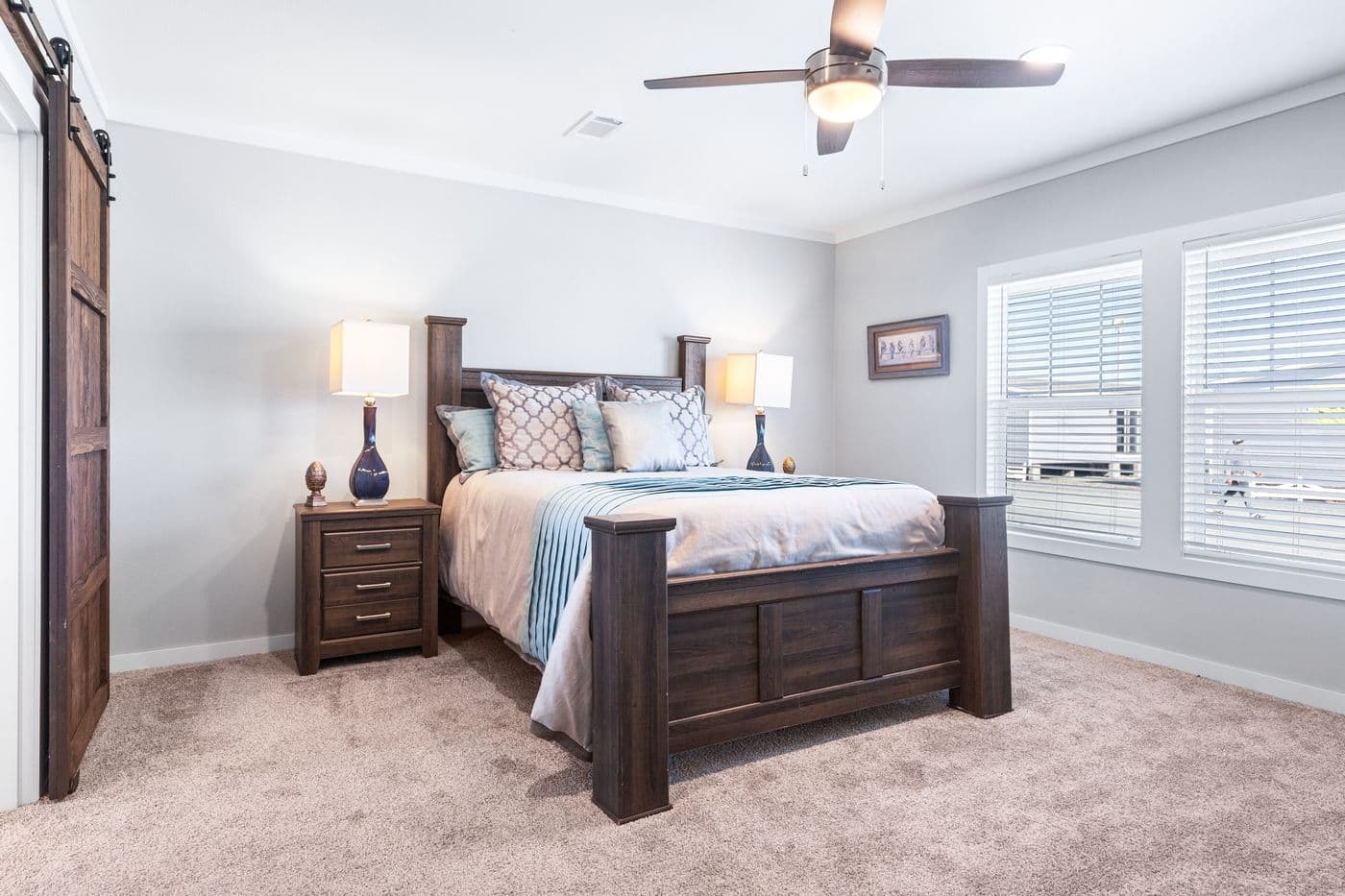 The THE FUJI Primary Bedroom. This Manufactured Mobile Home features 4 bedrooms and 3 baths.