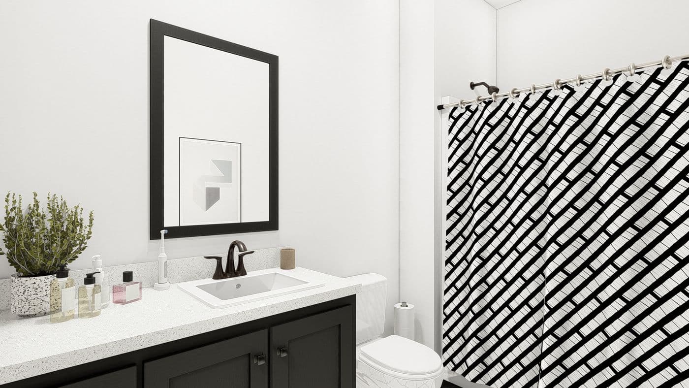 The ING621K TAMARACK GW Guest Bathroom. This Manufactured Mobile Home features 3 bedrooms and 2 baths.
