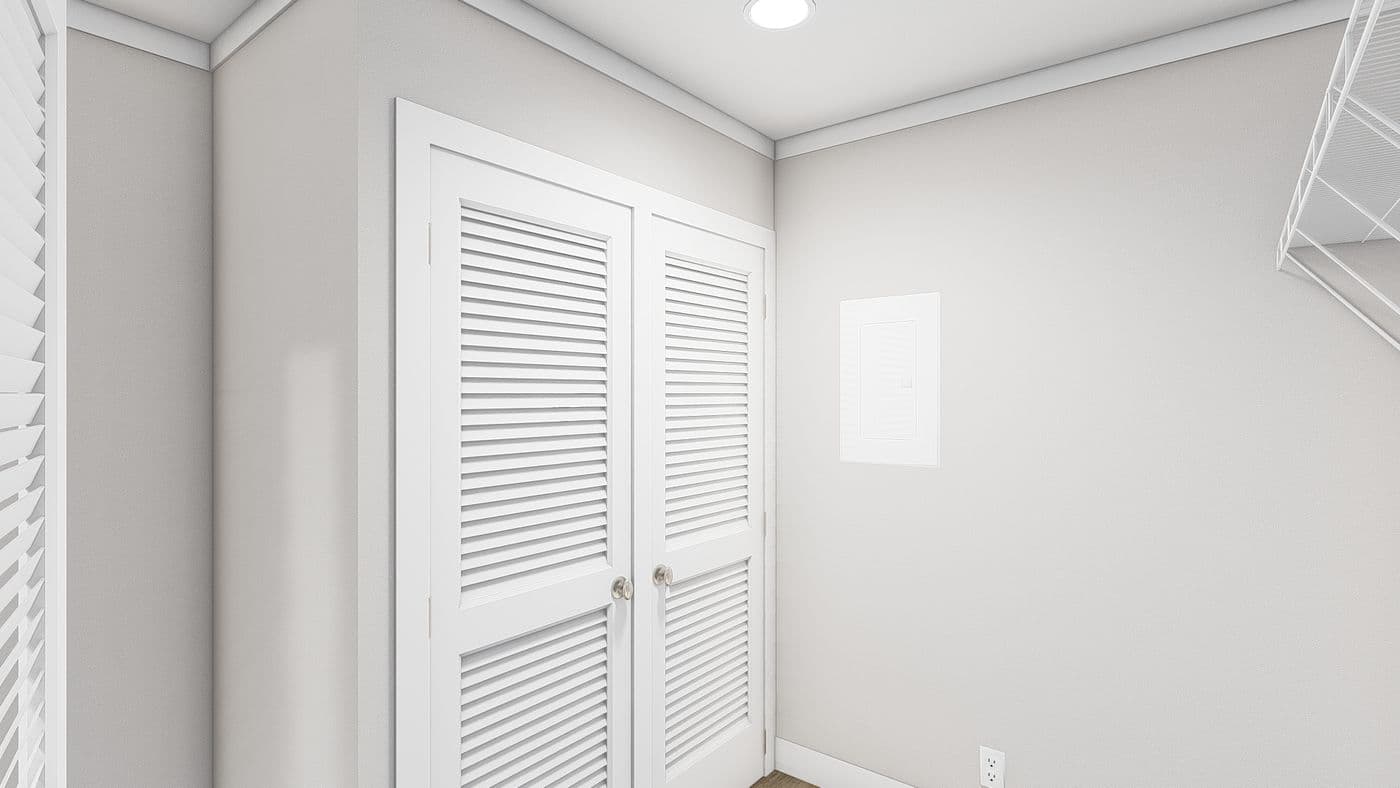 The LET IT BE Utility Room. This Manufactured Mobile Home features 3 bedrooms and 2 baths.
