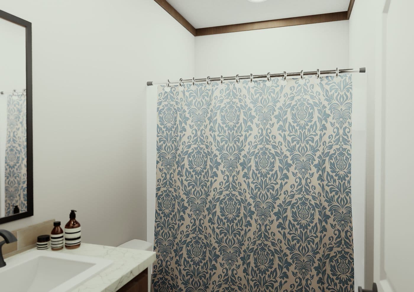 The THE ELITE Guest Bathroom. This Manufactured Mobile Home features 3 bedrooms and 2 baths.