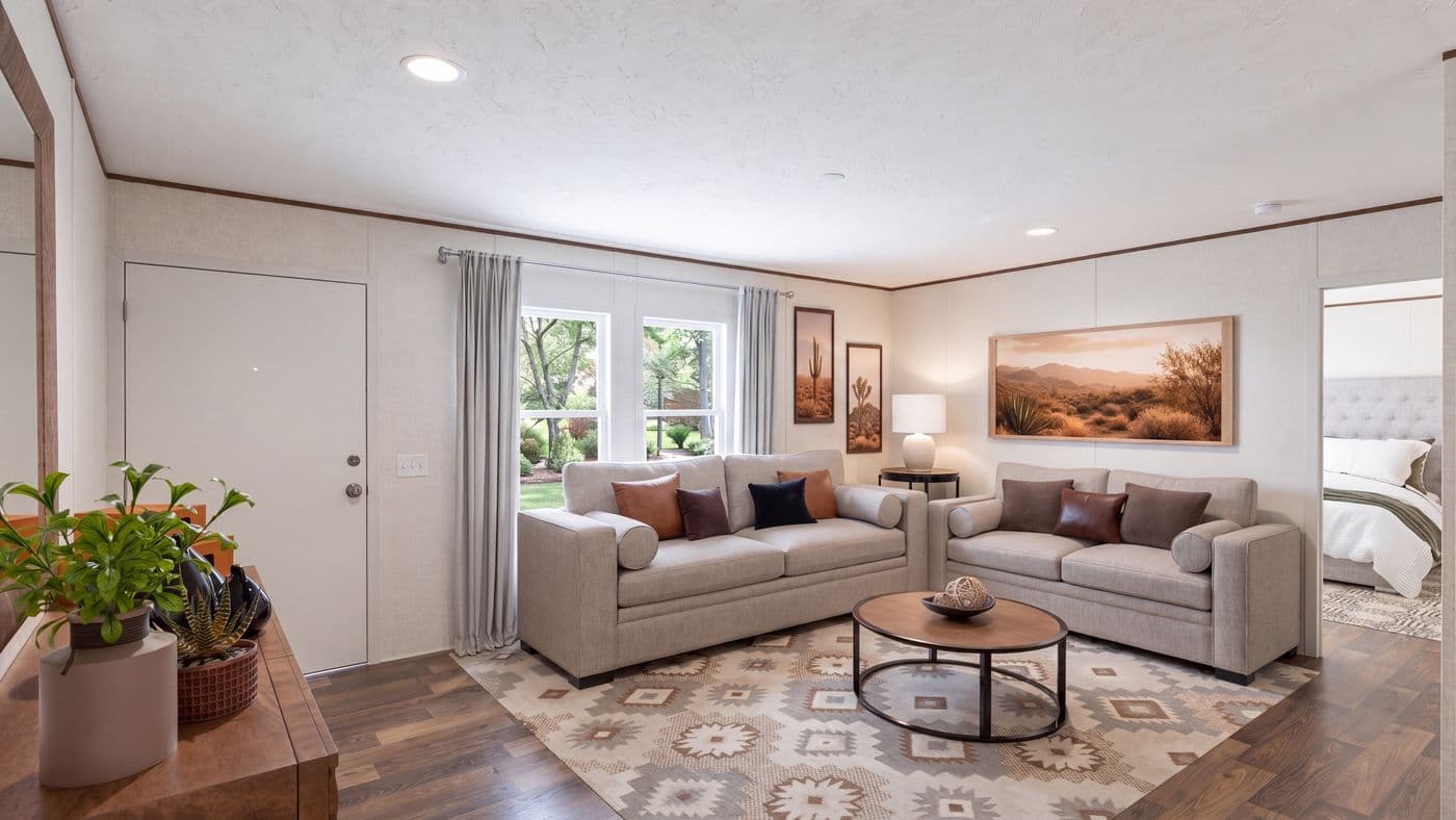 The CEDAR Living Room. This Manufactured Mobile Home features 3 bedrooms and 2 baths.
