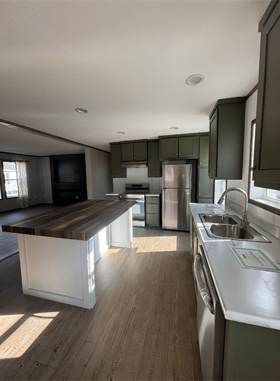 The APATITE 44 Kitchen. This Manufactured Mobile Home features 3 bedrooms and 2 baths.