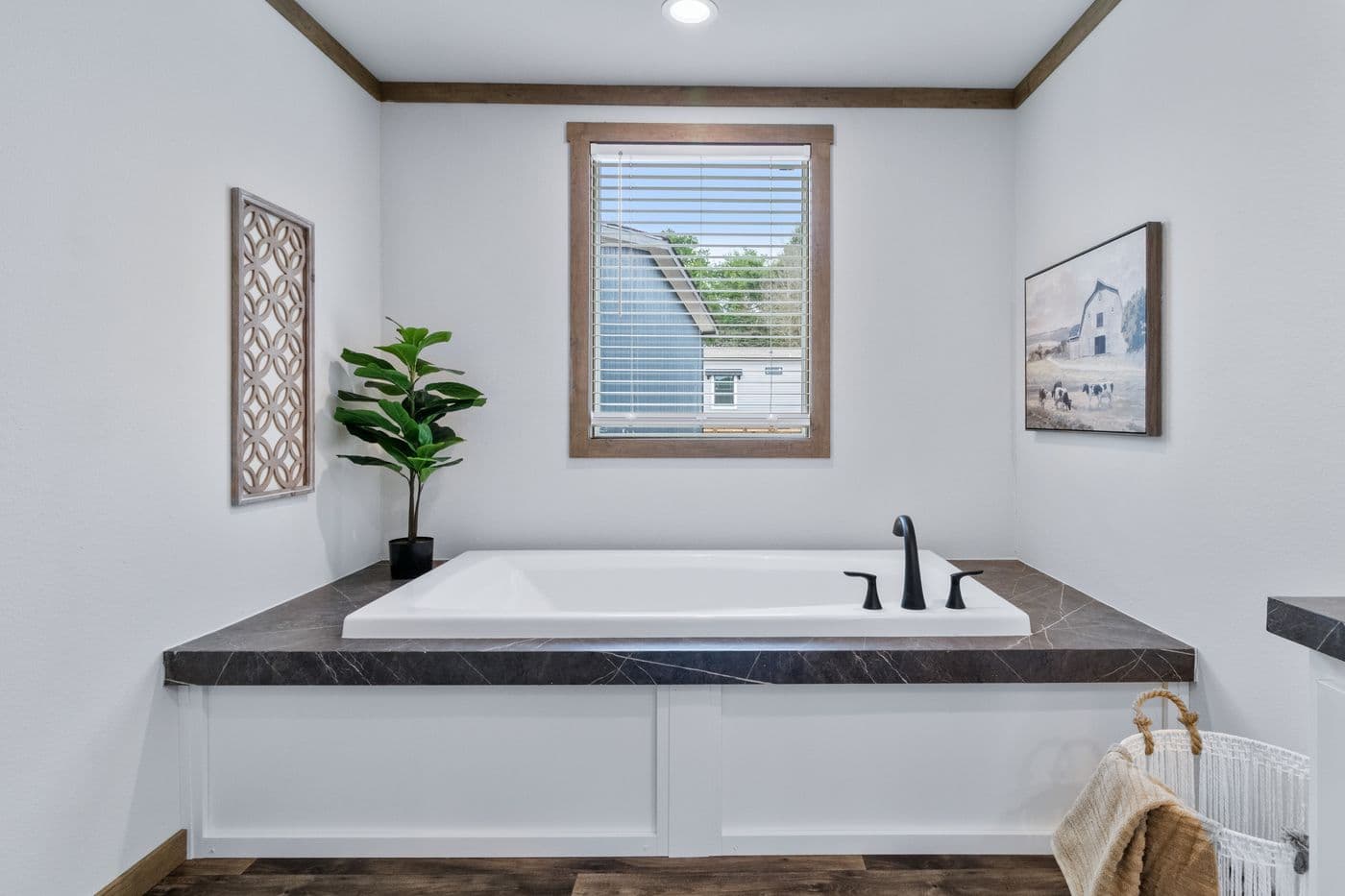 The SAWYER ELITE Primary Bathroom. This Manufactured Mobile Home features 3 bedrooms and 2 baths.