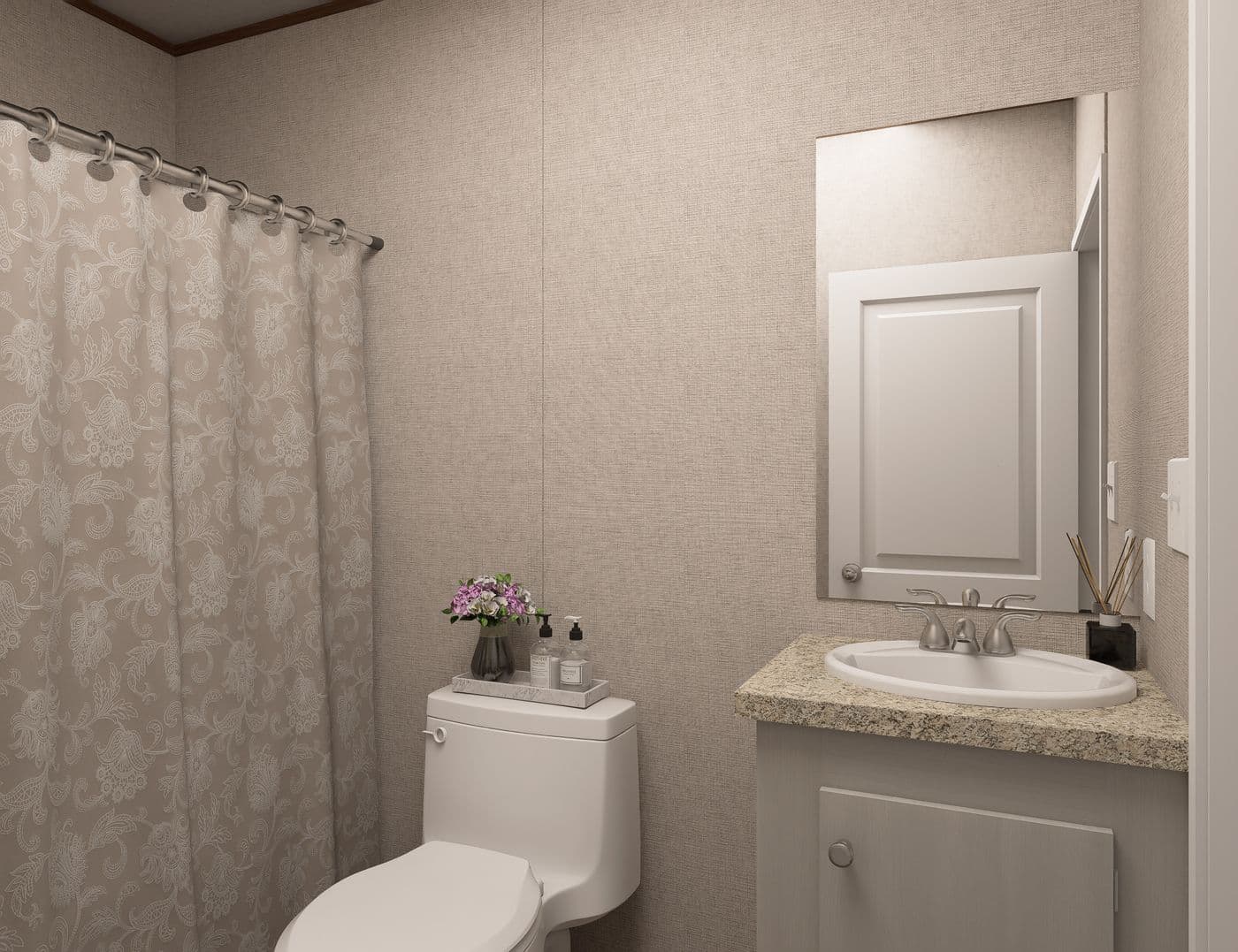 The REDWOOD Guest Bathroom. This Manufactured Mobile Home features 5 bedrooms and 3 baths.