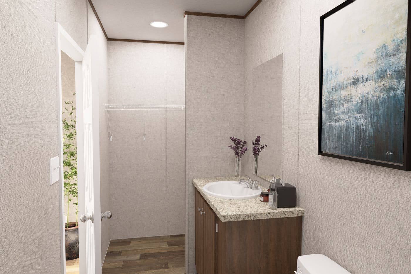 The MAGNOLIA Primary Bathroom. This Manufactured Mobile Home features 3 bedrooms and 2 baths.