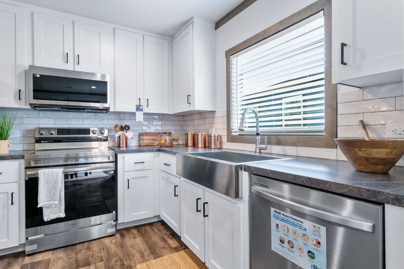 The SAWYER ELITE Kitchen. This Manufactured Mobile Home features 3 bedrooms and 2 baths.