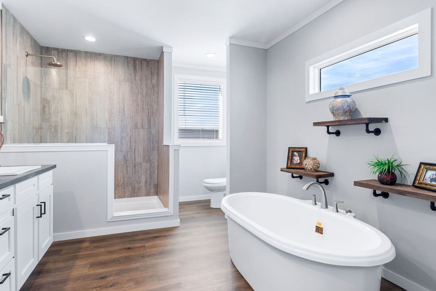 The THE FUJI Primary Bathroom. This Manufactured Mobile Home features 4 bedrooms and 3 baths.