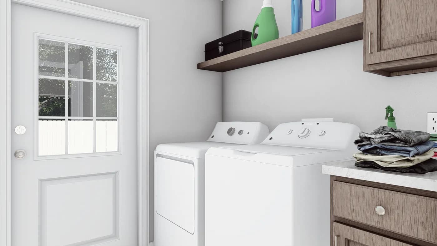 The THE SOUTHERN CHARM Utility Room. This Manufactured Mobile Home features 3 bedrooms and 2 baths.