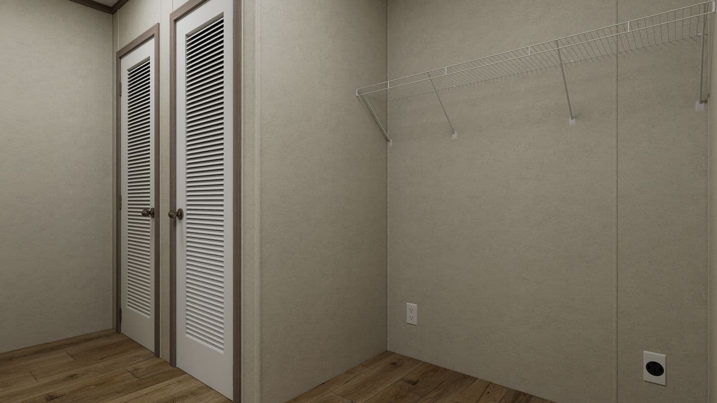The 5224-CC55 STONEBRIDGE 52 Utility Room. This Manufactured Mobile Home features 3 bedrooms and 2 baths.