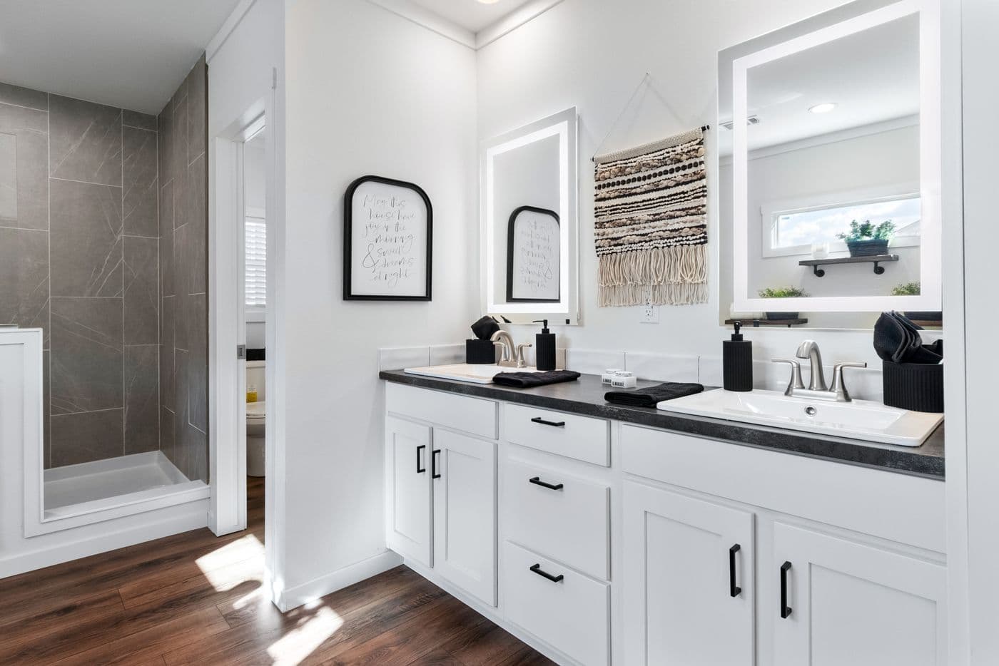 The THE SEDONA 4 Primary Bathroom. This Manufactured Mobile Home features 4 bedrooms and 2 baths.
