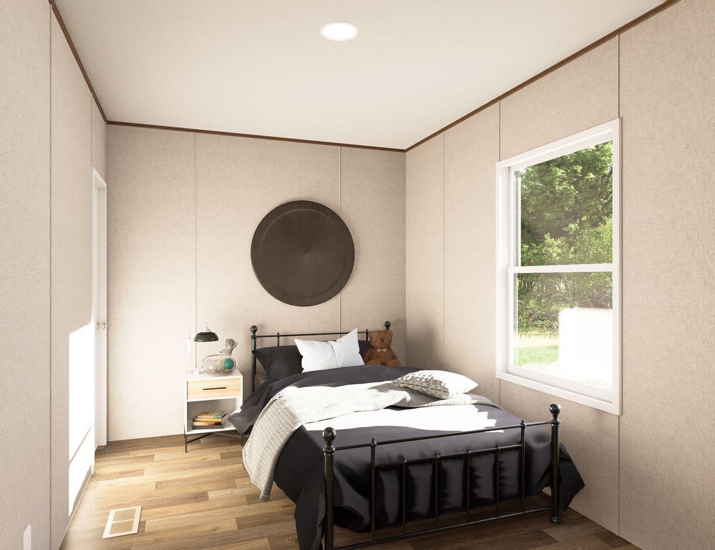 The DOGWOOD Primary Bedroom. This Manufactured Mobile Home features 2 bedrooms and 2 baths.