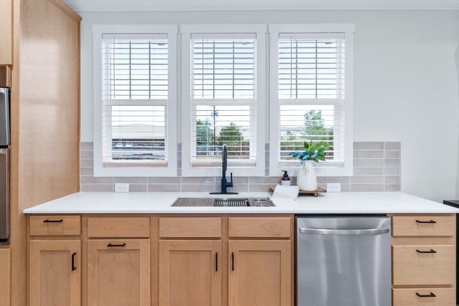 The THE ARCHIBALD Kitchen. This Manufactured Mobile Home features 4 bedrooms and 2 baths.