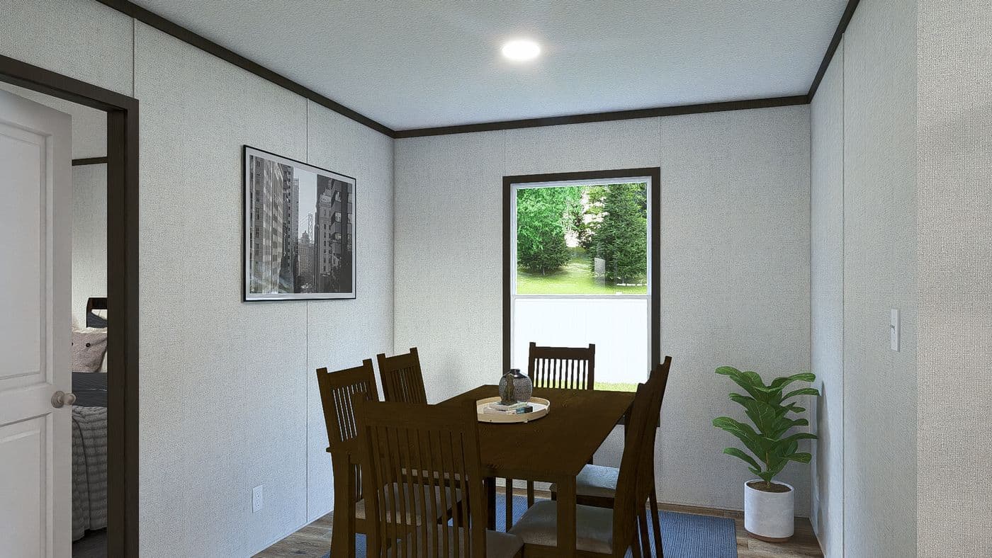 The GRAND Dining Room. This Manufactured Mobile Home features 3 bedrooms and 2 baths.