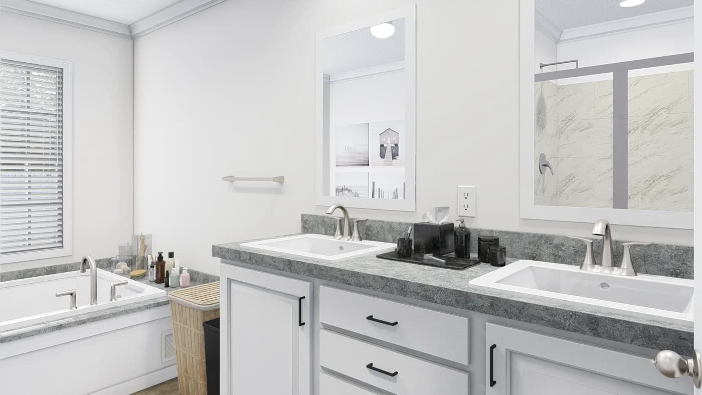 The BIG EASY M001 Primary Bathroom. This Manufactured Mobile Home features 4 bedrooms and 2 baths.