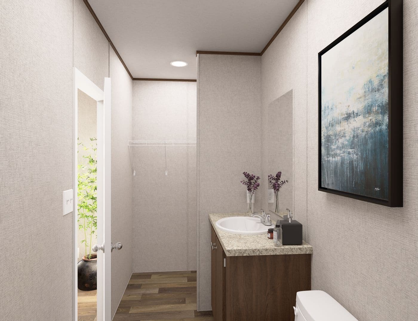 The DOGWOOD Primary Bathroom. This Manufactured Mobile Home features 2 bedrooms and 2 baths.