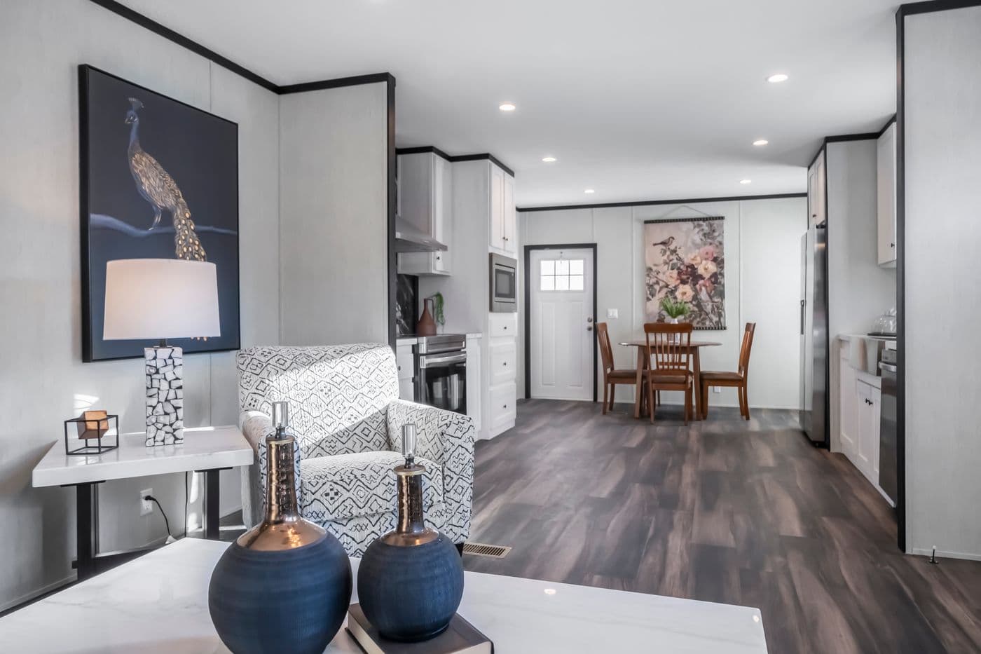 The LIL SOUTHERN CHARM Kitchen. This Manufactured Mobile Home features 3 bedrooms and 2 baths.