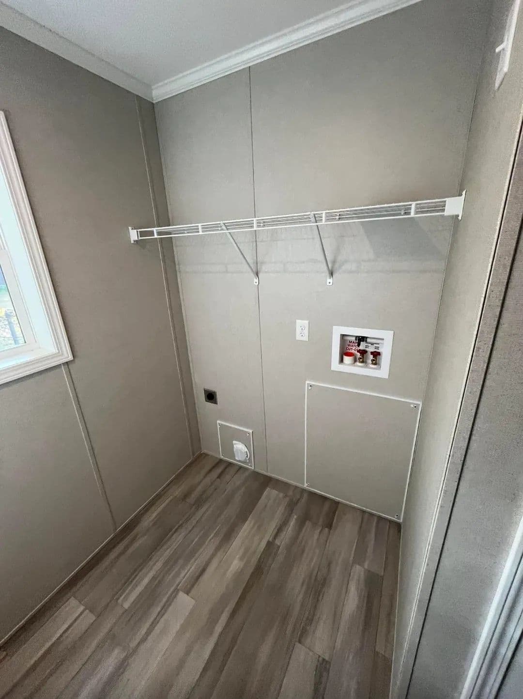 The PERIDOT 60 Utility Room. This Manufactured Mobile Home features 2 bedrooms and 2 baths.
