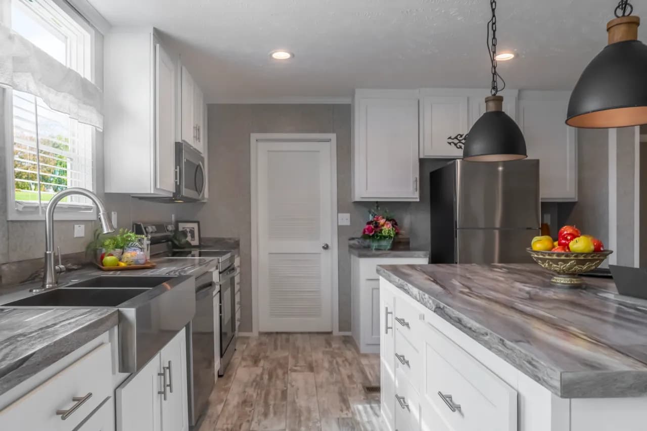 The NUMBER ONE Exterior. This Manufactured Mobile Home features 3 bedrooms and 2 baths.