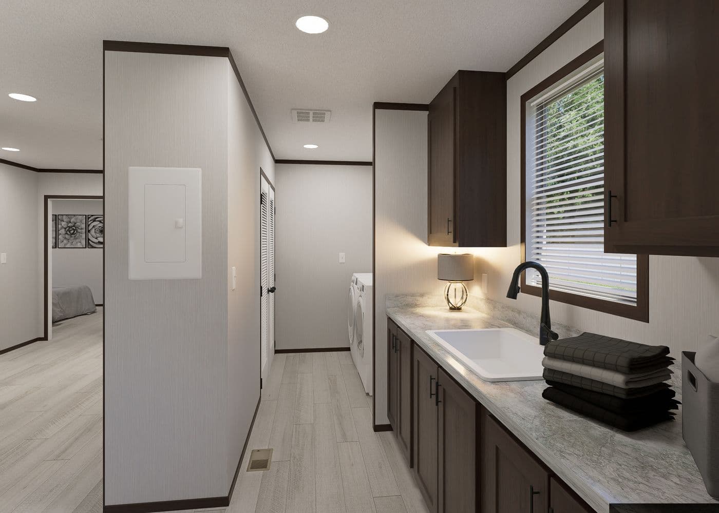 The SAPPHIRE Utility Room. This Manufactured Mobile Home features 4 bedrooms and 2 baths.