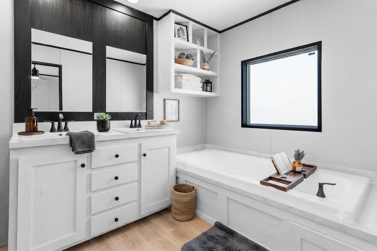 The RESOLUTION 16803B Primary Bathroom. This Manufactured Mobile Home features 3 bedrooms and 2 baths.
