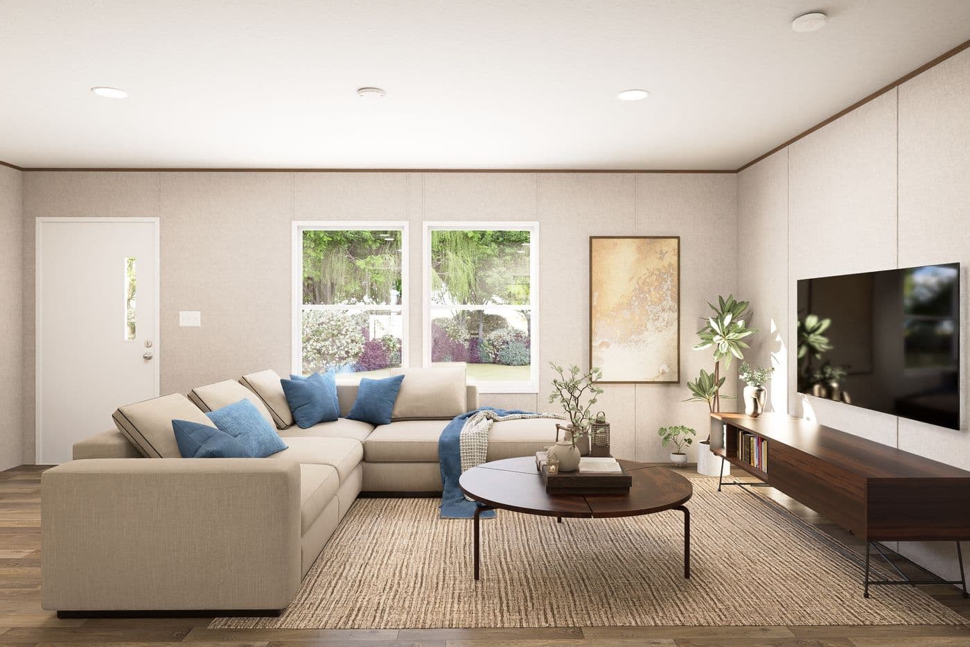The MAPLE Living Room. This Manufactured Mobile Home features 3 bedrooms and 2 baths.