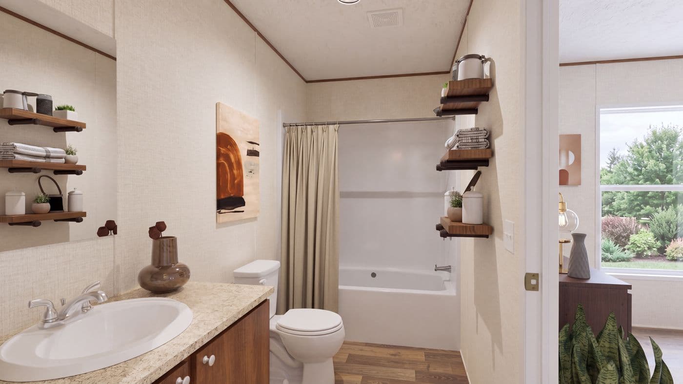 The MAGNOLIA Primary Bathroom. This Manufactured Mobile Home features 3 bedrooms and 2 baths.