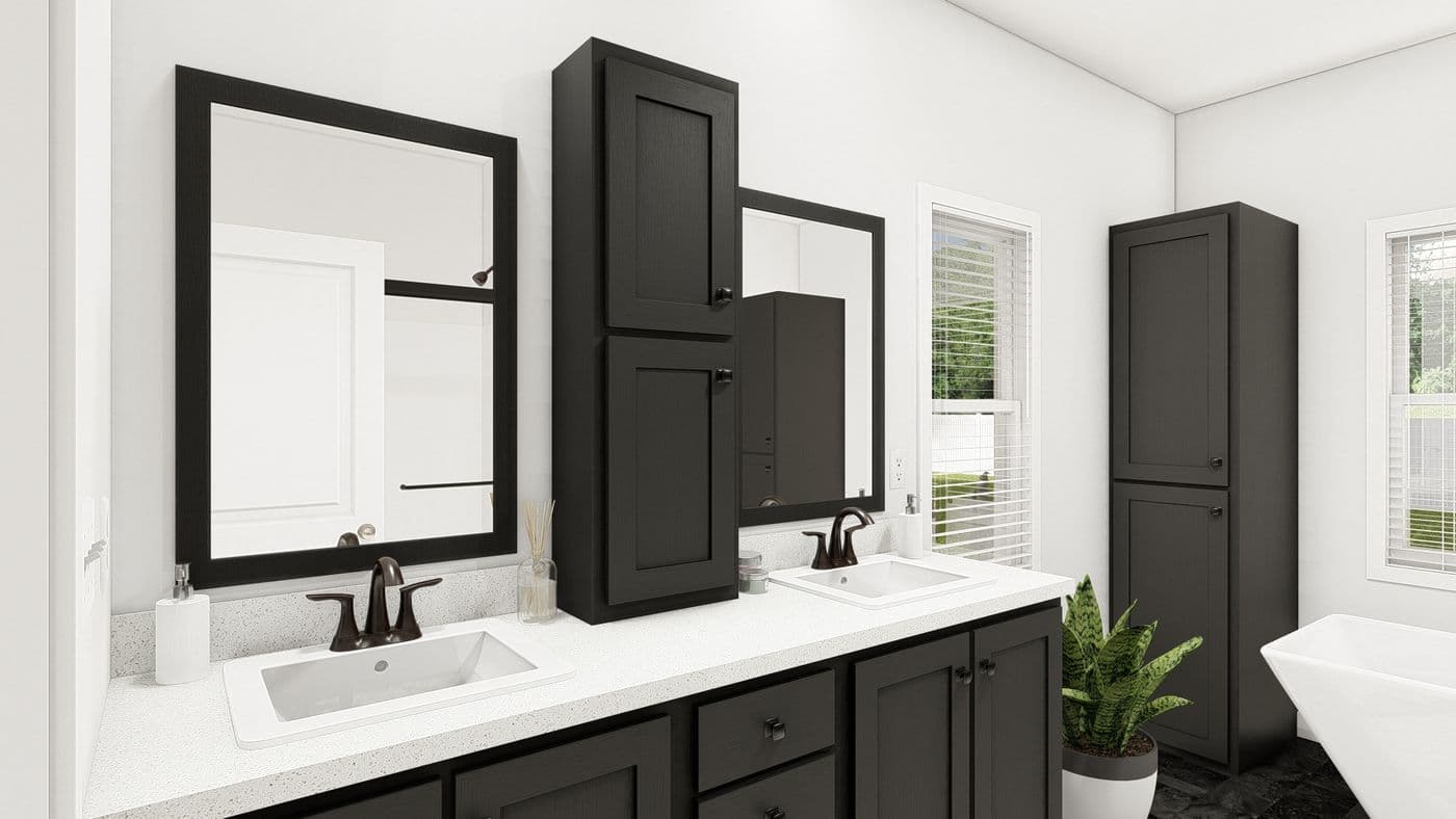 The ING621K TAMARACK GW Primary Bathroom. This Manufactured Mobile Home features 3 bedrooms and 2 baths.