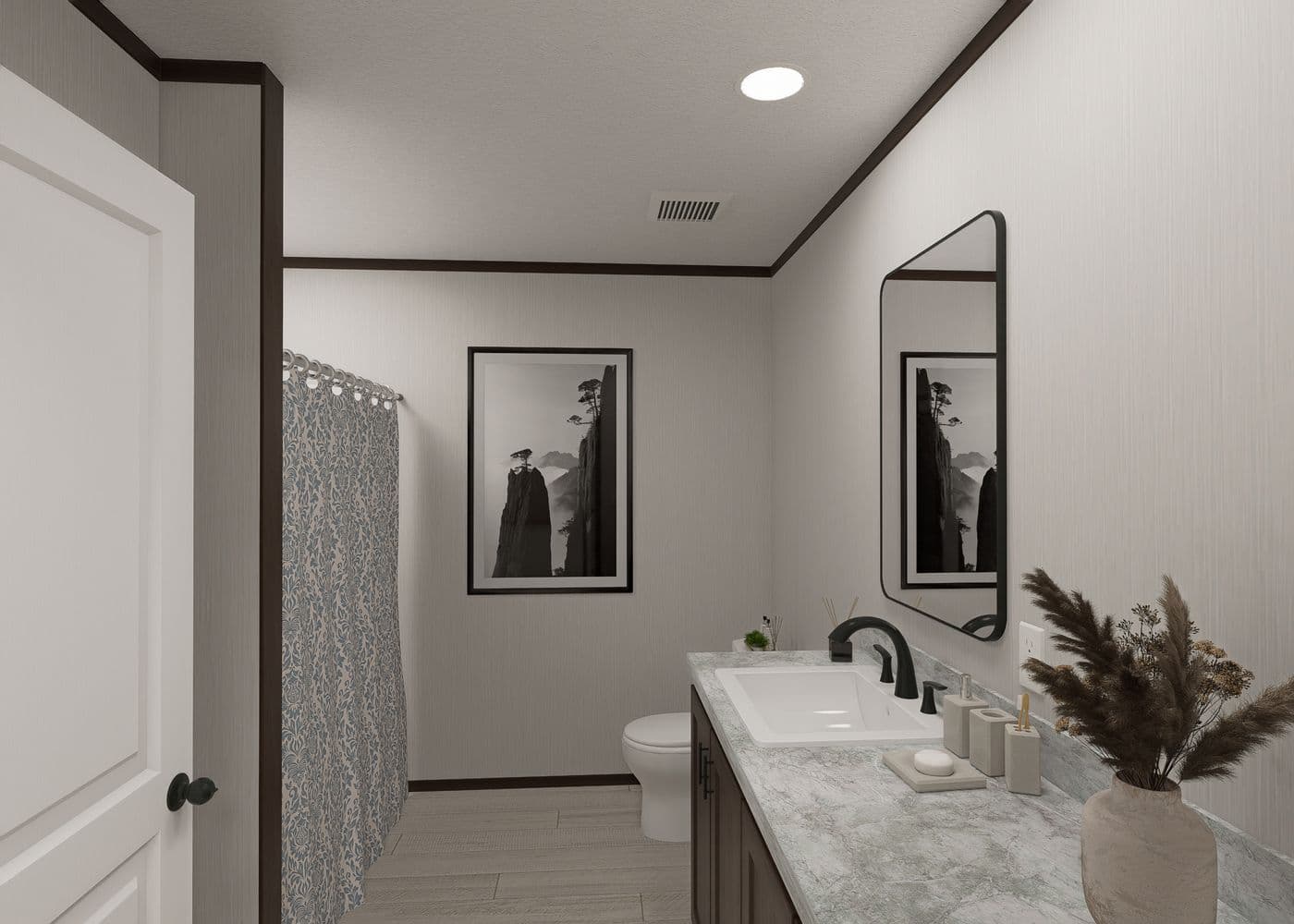 The SAPPHIRE Guest Bathroom. This Manufactured Mobile Home features 4 bedrooms and 2 baths.