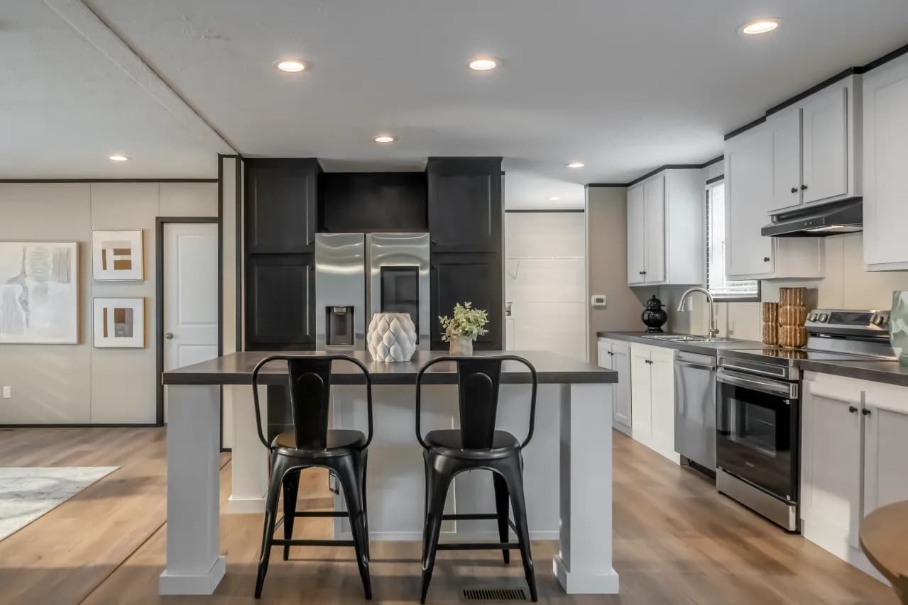 The PLATINUM ANNIVERSARY Exterior. This Manufactured Mobile Home features 3 bedrooms and 2 baths.