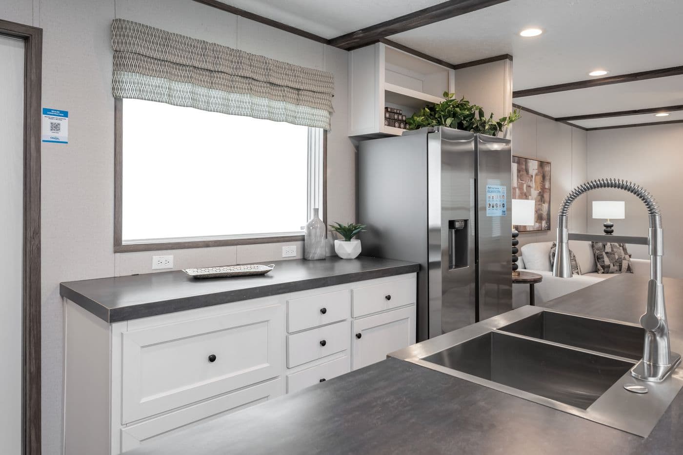 The THE GENERAL Kitchen. This Manufactured Mobile Home features 3 bedrooms and 2 baths.