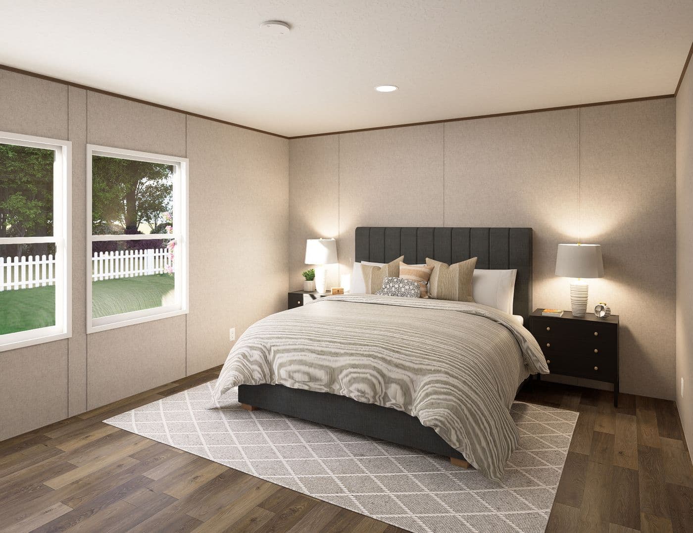 The SPRUCE Primary Bedroom. This Manufactured Mobile Home features 3 bedrooms and 2 baths.