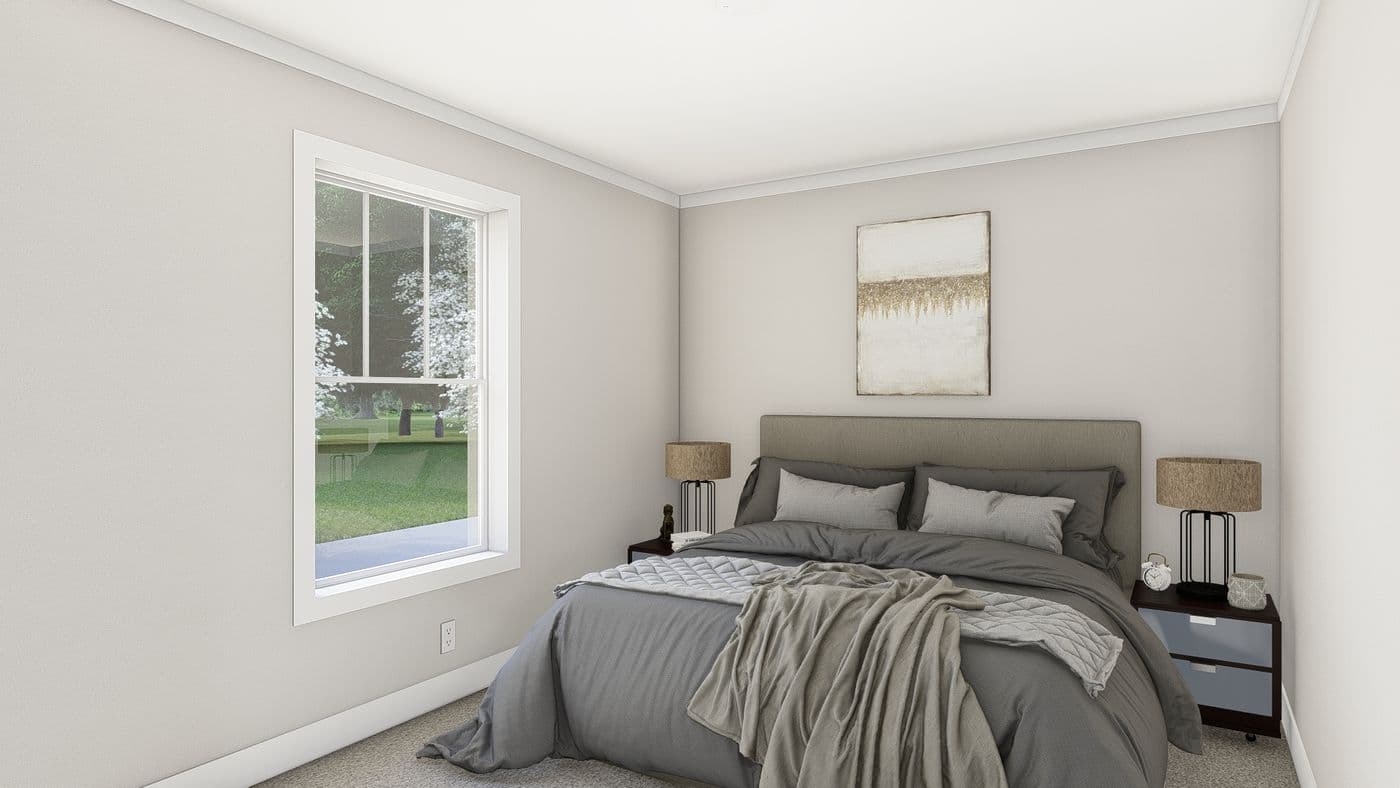 The LEAN ON ME Primary Bedroom. This Manufactured Mobile Home features 3 bedrooms and 2 baths.