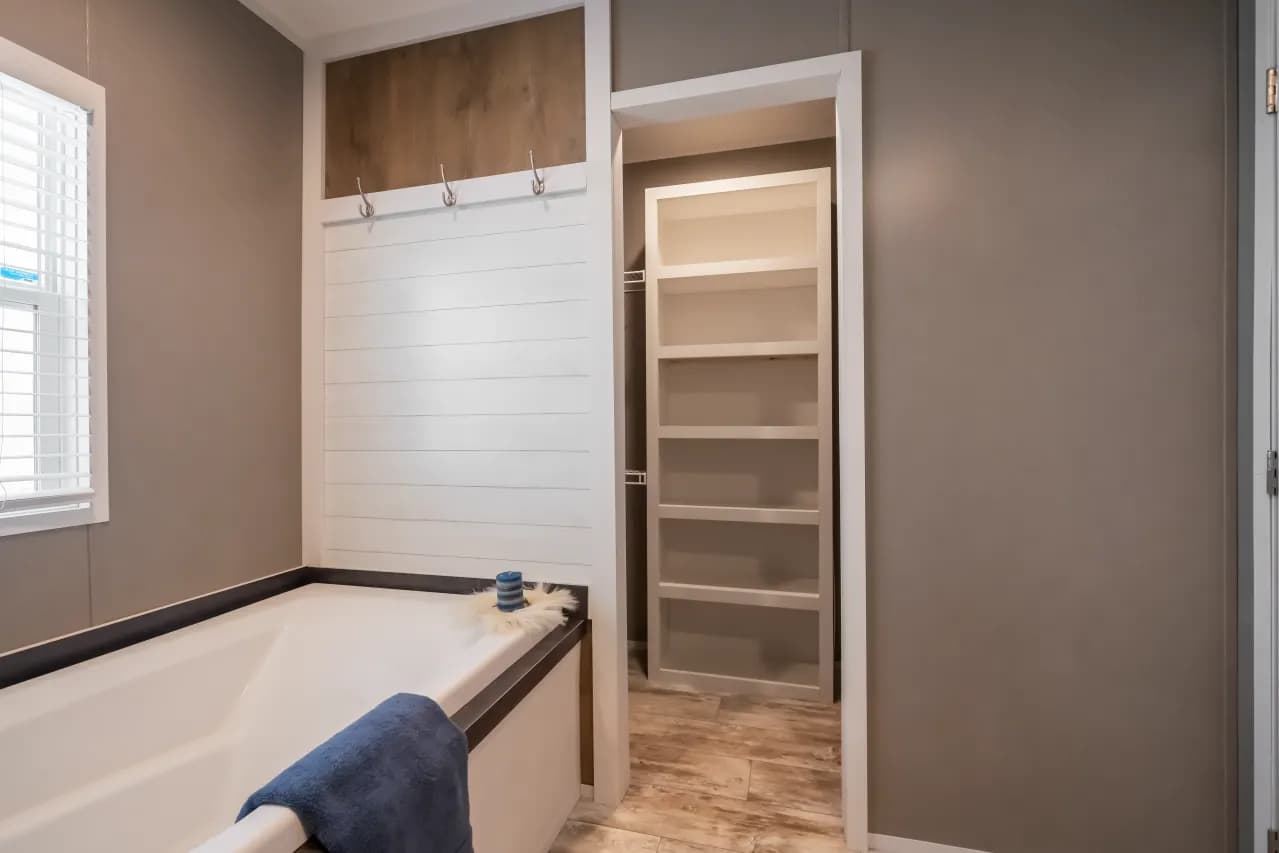 The LIBERTY Primary Bathroom. This Manufactured Mobile Home features 3 bedrooms and 2 baths.