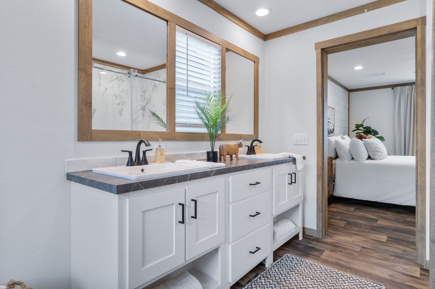 The SAWYER ELITE Primary Bathroom. This Manufactured Mobile Home features 3 bedrooms and 2 baths.