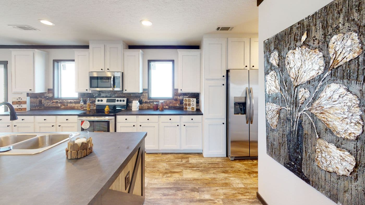 The BOUJEE XL 2 Kitchen. This Manufactured Mobile Home features 4 bedrooms and 3 baths.