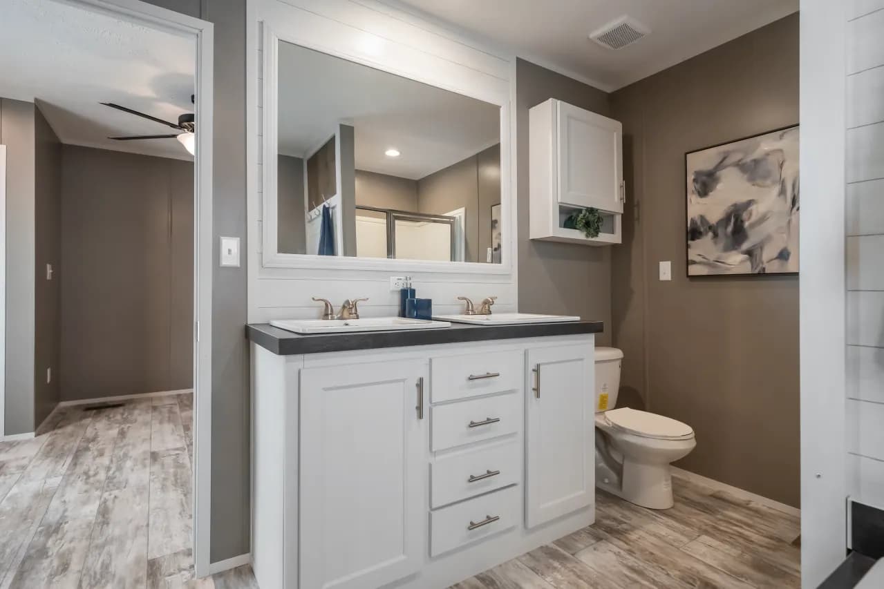 The LIBERTY Primary Bathroom. This Manufactured Mobile Home features 3 bedrooms and 2 baths.
