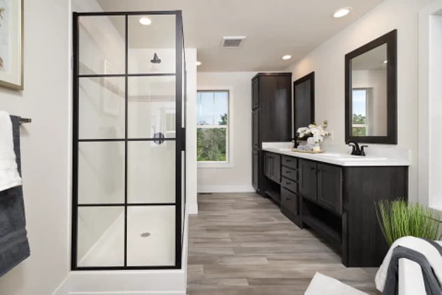 The STRATFORD PL 6630-MS062 SECT Primary Bathroom. This Manufactured Mobile Home features 3 bedrooms and 2 baths.