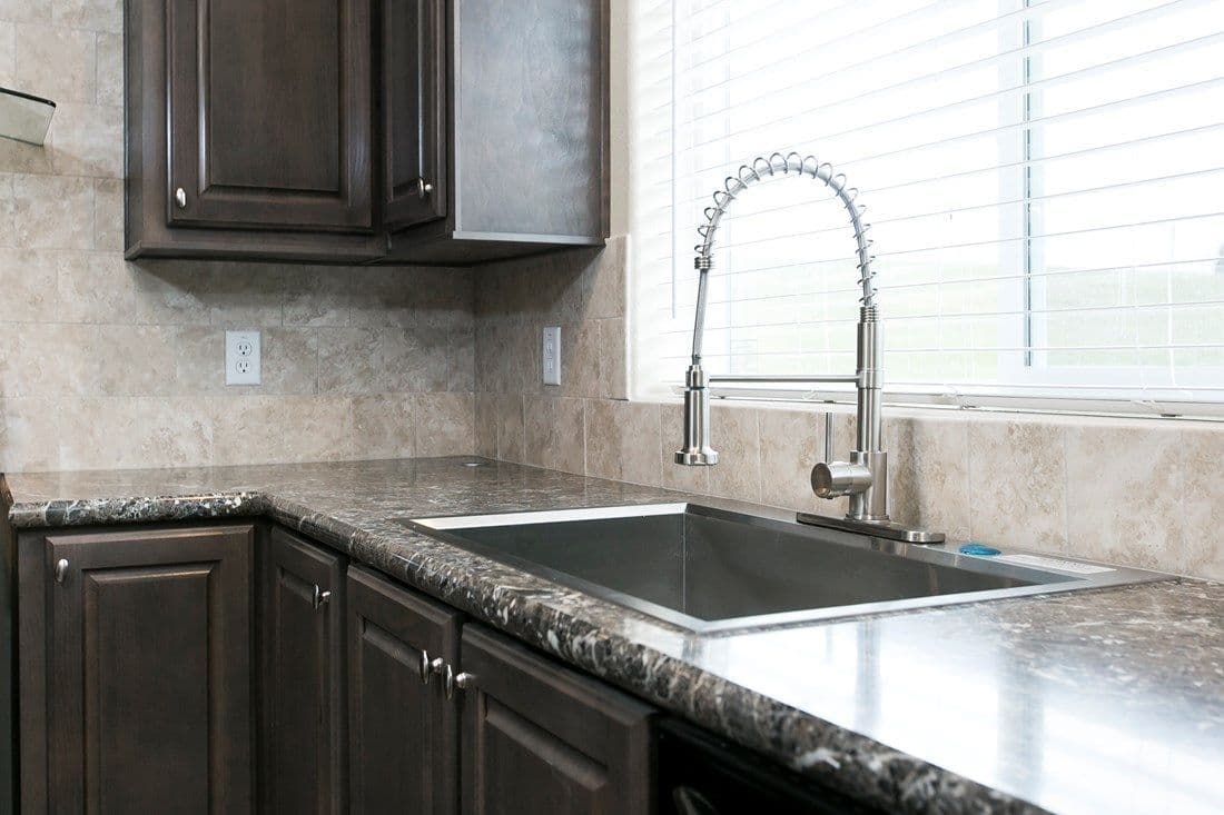 The 2023 COLUMBIA RIVER (NEW) Kitchen. This Manufactured Mobile Home features 3 bedrooms and 2 baths.