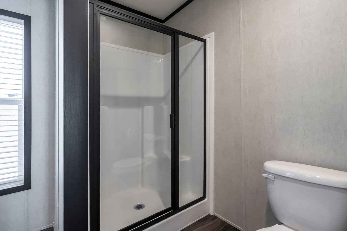 The LIL SOUTHERN CHARM Primary Bathroom. This Manufactured Mobile Home features 3 bedrooms and 2 baths.