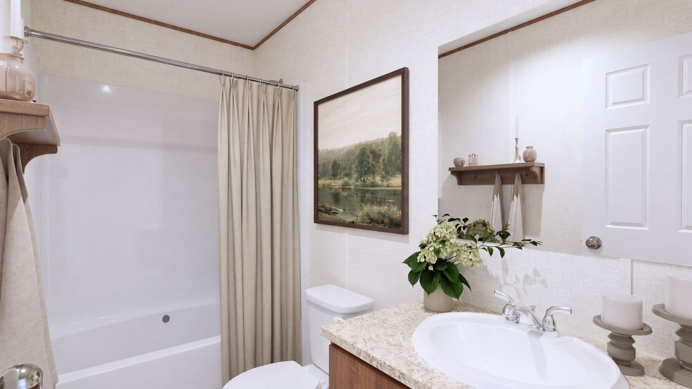 The ELM Primary Bathroom. This Manufactured Mobile Home features 2 bedrooms and 1 bath.