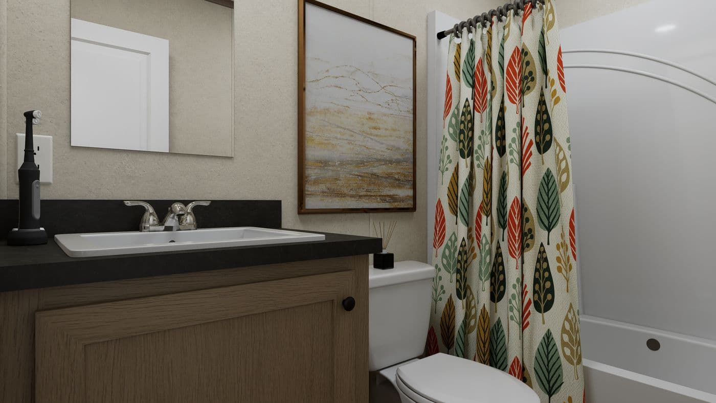 The 5224-CC55 STONEBRIDGE 52 Guest Bathroom. This Manufactured Mobile Home features 3 bedrooms and 2 baths.