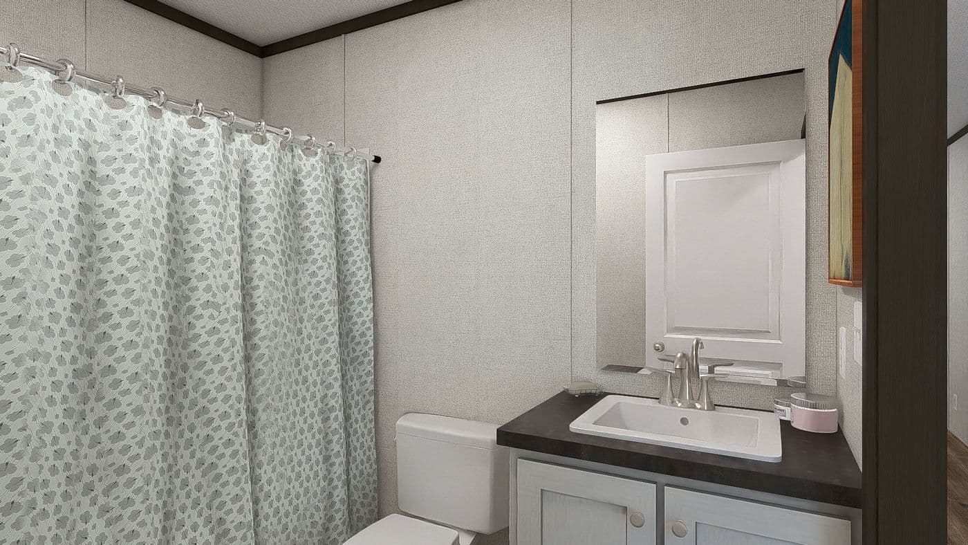 The SENSATION Guest Bathroom. This Manufactured Mobile Home features 3 bedrooms and 2 baths.