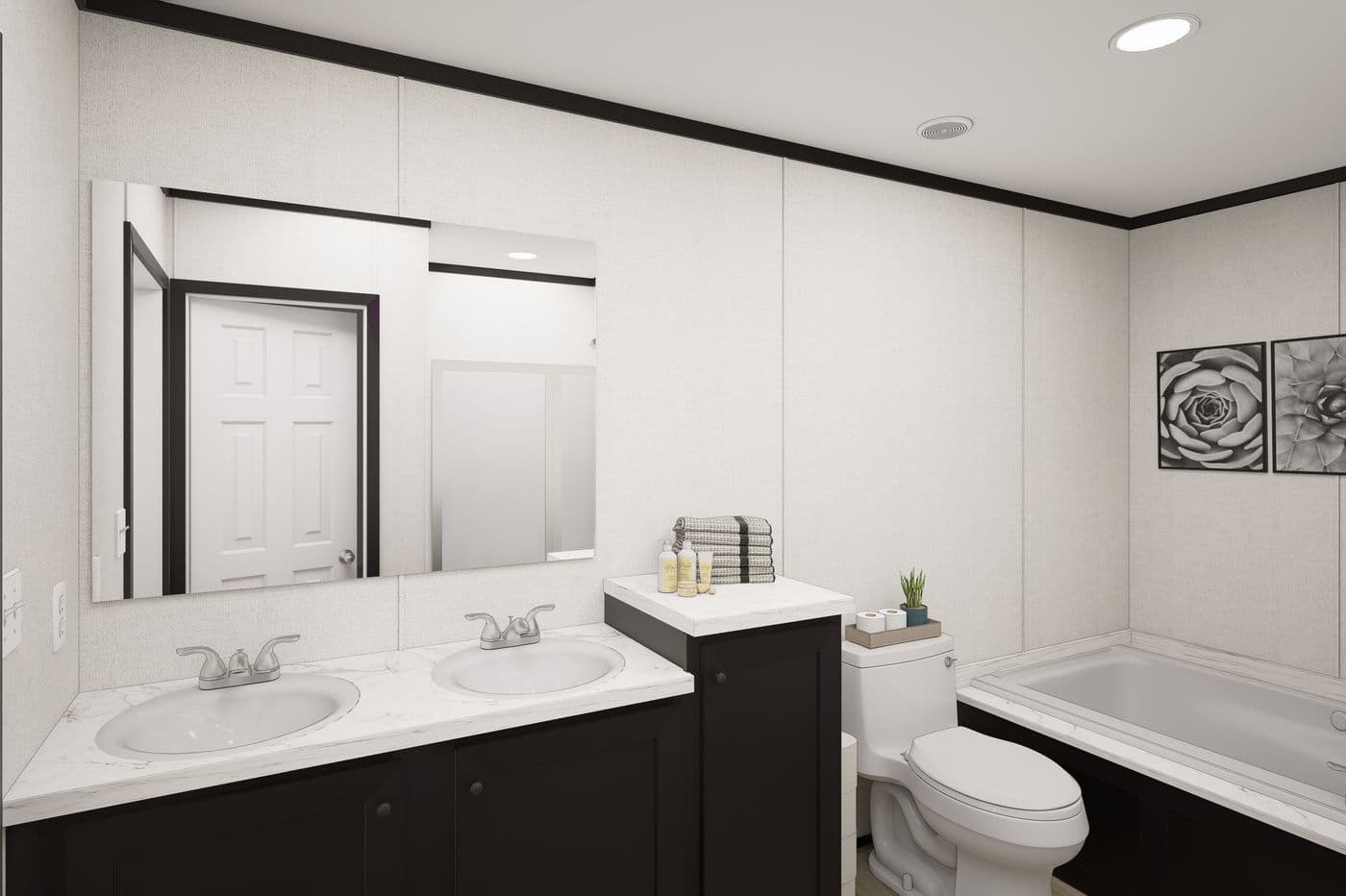 The PLATINUM ANNIVERSARY Exterior. This Manufactured Mobile Home features 3 bedrooms and 2 baths.