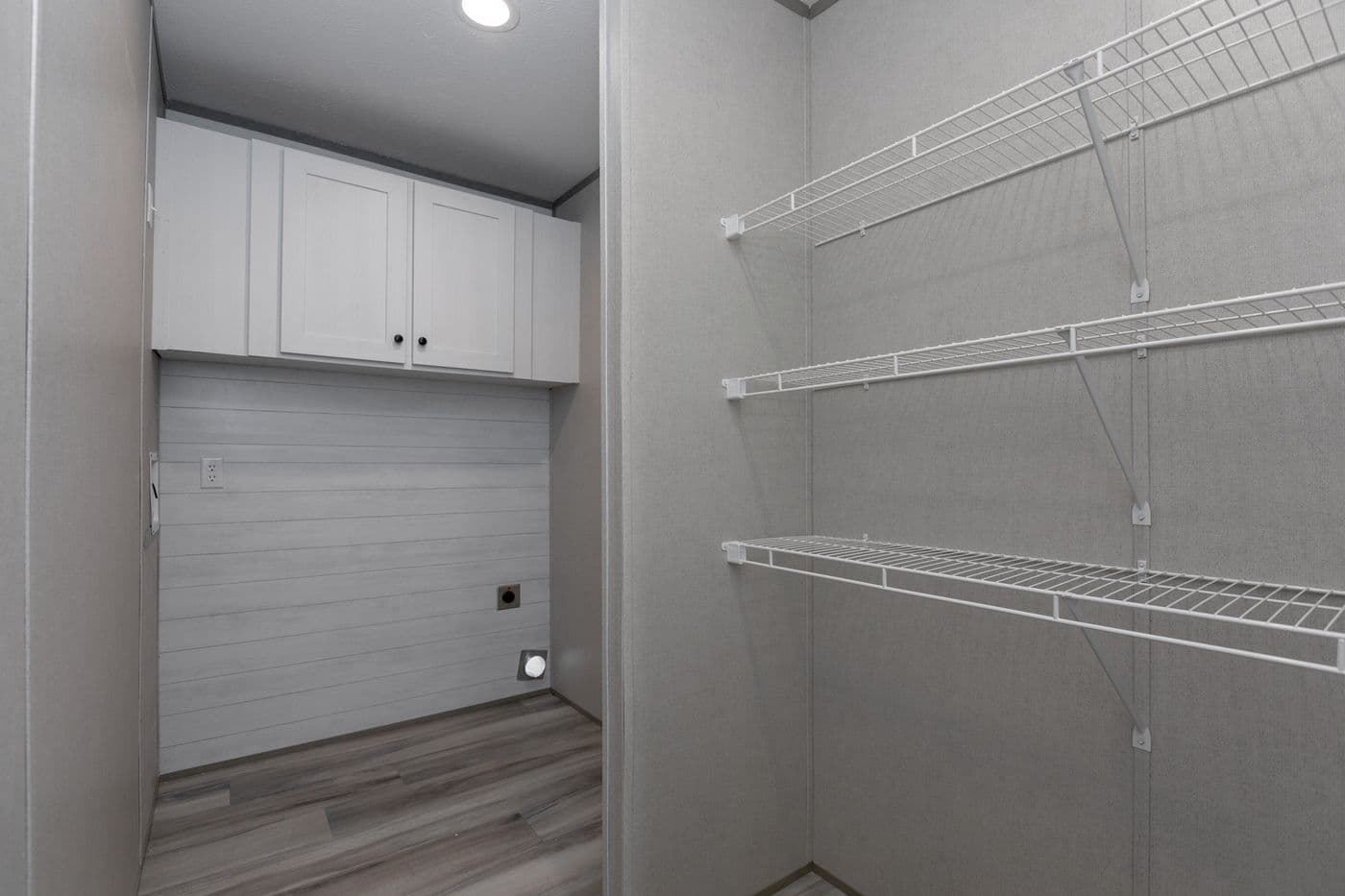The THE PANTRY HOUSE Utility Room. This Manufactured Mobile Home features 3 bedrooms and 2 baths.