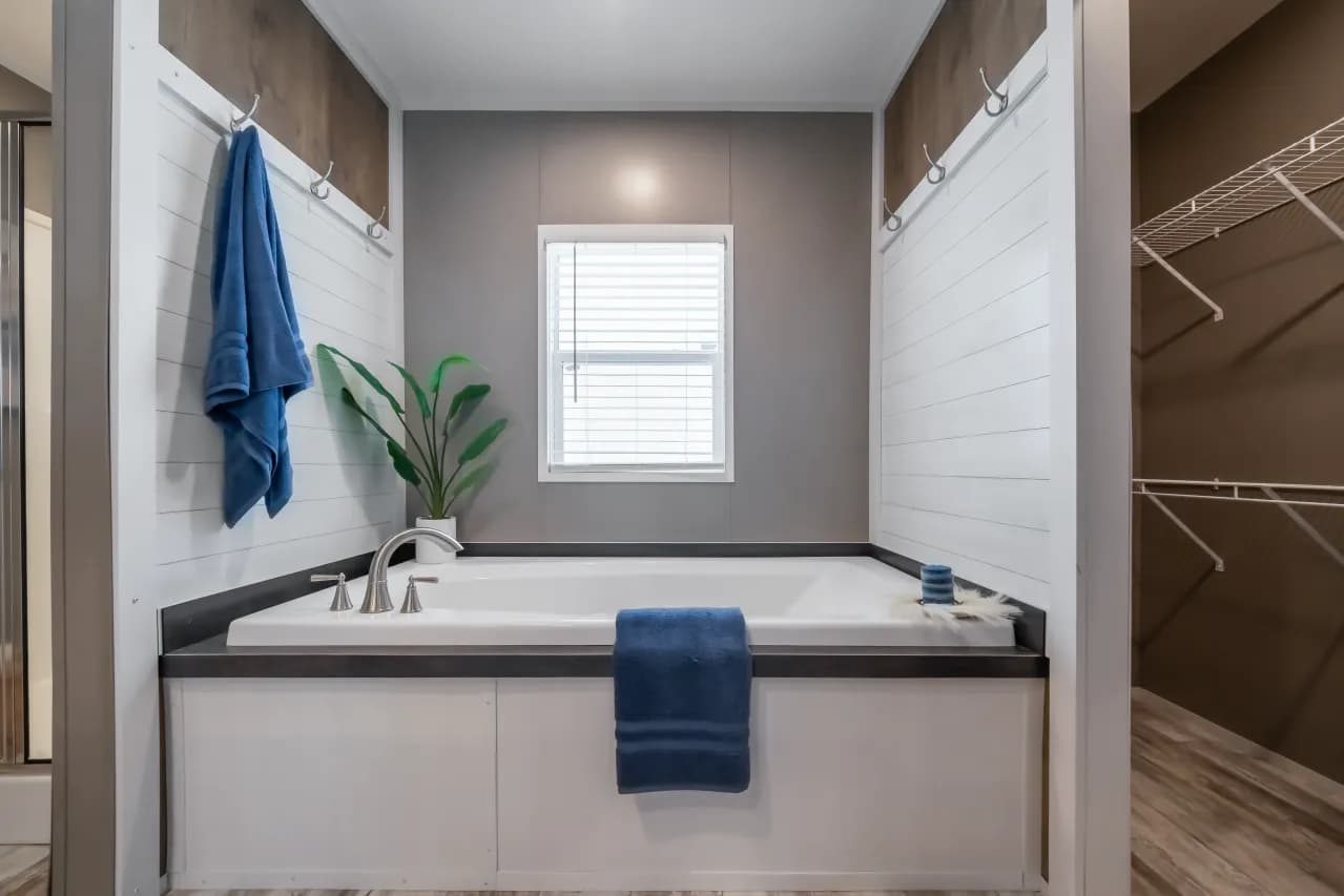The LIBERTY Primary Bathroom. This Manufactured Mobile Home features 3 bedrooms and 2 baths.